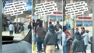 Jaladores se disputan a pasajero para llenar su combi y este se aferra a poste