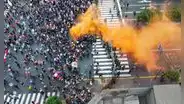 'Marcha en Lima': PNP lanza bombas lacrimógenas a manifestantes en avenida Abancay