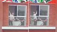 Adulta mayor baila marinera desde la ventana de su casa durante el Gran Desfile Militar