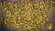 Arqueólogos descubren un tesoro con cientos de monedas de oro y joyas valiosas en una aldea abandonada hace 2.200 años