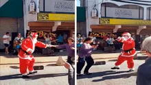Facebook viral: Papá Noel se mueve al ritmo de cumbia al lado de una señora en la calle [VIDEO] 