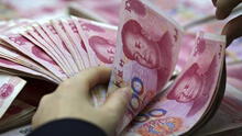 China: El yuan cae a mínimos frente al dólar desde hace 11 años  