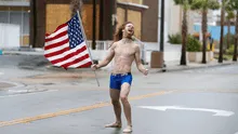 YouTube: hombre semidesnudo retó al huracán Florence con bandera de EE.UU. [VIDEO]