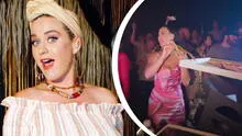 Katy Perry es captada arrojando  tajadas de pizza en una discoteca