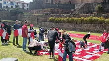 Cusqueños rompen récord Guinness al formar el año 2023 con 1.188 banderas de Perú
