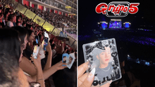 Fans del Grupo 5 muestran su amor por idols al cantar a sus photocards en el concierto