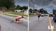 Captan instante en el que hombre se enfrenta 'sin ayuda' a un caimán en una calle de Estados Unidos