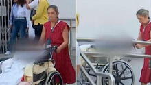 Mujer de 92 años arriesga su vida al llegar en silla de ruedas al Banco de la Nación para reclamar aportes