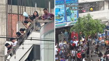 Comerciantes de Gamarra sorprenden al lanzar ropa desde los techos de las galerías: “Su mejor cábala”