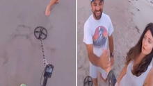 Pareja a punto de casarse pierde su anillo en la playa y un hombre con detector de metales lo encuentra Pareja a punto de casarse pierde su anillo en la playa y un hombre con detector de metales lo encuentra