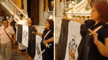 Peruanos alzan bandera de luto en misa convocada por Embajada de Perú en Madrid: "No hay Fiestas Patrias con un gobierno asesino"