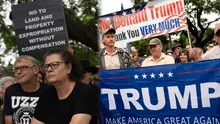 First group of white South Africans arrive in the US under Trump's refugee program