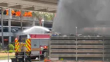 Florida airport suspends operations after car fire in parking garage, according to officials