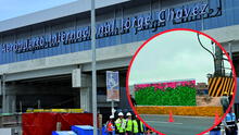 Giant billboards with flowers placed to simulate green areas around the new Jorge Chavez Airport