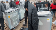 Peruano en Ancón se sorprende al ver que pescadores venden lavadoras caídas de contenedores al mar en S/300: "Tiene todas las piezas"