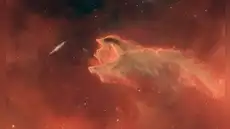 A 1.300 años luz de distancia: la impresionante imagen de un ‘monstruo cósmico devorando' una galaxia