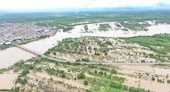 Río Piura se desborda e inunda a todo Tambogrande