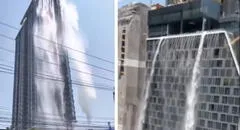 El agua de una piscina en azotea inunda las calles de Bangkok al quebrarse durante el terremoto en Tailandia