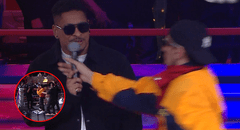 Sujeto irrumpe en el ring de 'La Noche Dorada' 2025 y le arrebata el micrófono al presentador para interpretar su canción: fue detenido a los pocos segundos
