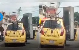 Taxista genera críticas al llevar una refrigeradora y mecedoras en su vehículo: “Irresponsable al volante”