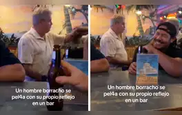 Hombre en estado de ebriedad se ve en un espejo y pelea con su propio reflejo en un bar