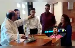 Niño se viraliza por su inesperada respuesta de si "quiere ser cristiano" en su bautizo: "No, quiero ser Messi"