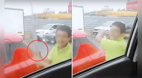 Con palo en mano, presunto chofer de bus destroza ventana de colectivero tras choque en Ventanilla