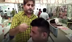 YouTube: Peluquero corta el cabello con 15 tijeras a la misma vez [VIDEO]