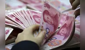 China: El yuan cae a mínimos frente al dólar desde hace 11 años  