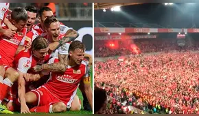 Hinchas invaden campo de juego para festejar ascenso de su equipo por primera vez en Bundesliga