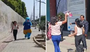 Acompañada de un 'dinosaurio' y entre aplausos: así llegó corriendo una postulante al examen de la UNT