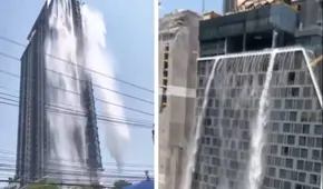El agua de una piscina en azotea inunda las calles de Bangkok al quebrarse durante el terremoto en Tailandia