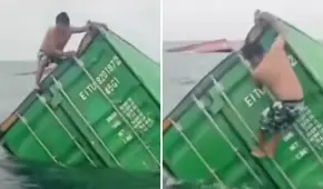 Pescador en Callao se sube a contenedor que cayó al mar peruano para sacar artículos y en redes dicen: "Quería saber qué venía en las cajas"