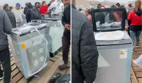 Peruano en Ancón se sorprende al ver que pescadores venden lavadoras caídas de contenedores al mar en S/300: "Tiene todas las piezas"