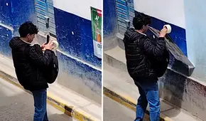 Joven peruano genera desconcierto tras pegar afiche y despegarlo segundos después: “¿Solo era para la foto?”