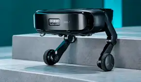 China muestra un robot aspirador que sube y limpia escaleras por sí solo: combina ruedas y patas articuladas para superar obstáculos