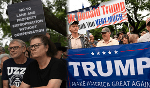 First group of white South Africans arrive in the US under Trump's refugee program
