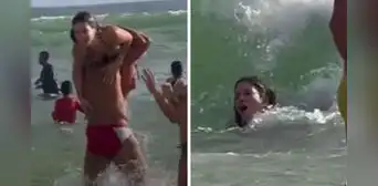Flavia Laos es arrojada al mar por Fabio Agostini y las olas la terminan revolcando Flavia Laos es arrojada al mar por Fabio Agostini y las olas la terminan revolcando