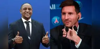 Lionel Messi recibe como regalo la camiseta firmada de Roberto Carlos Lionel Messi recibe como regalo la camiseta firmada de Roberto Carlos