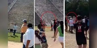 A palazos obligan a turista a bajar de pirámide en Chichen Itzá A palazos obligan a turista a bajar de pirámide en Chichen Itzá
