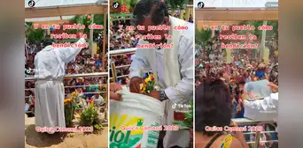 Sacerdote bendice a feligreses, pero ante intenso calor termina lanzando baldes de agua