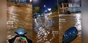 “Preciso un barco”: joven motociclista graba calles de Piura tras lluvia de 6 horas “Preciso un barco”: joven motociclista graba calles de Piura tras lluvia de 6 horas