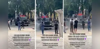 Joven se sube a vehículo lanza agua para evitar represión contra manifestantes del 8M en México Joven se sube a vehículo lanza agua para evitar represión contra manifestantes del 8M en México