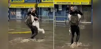 Joven enternece las redes sociales tras cargar a su novia en plena inundación: “Todo un caballero”