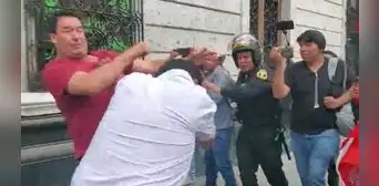 Congresista Edwin Martínez se enfrenta a golpes con manifestante en Arequipa Congresista Edwin Martínez se enfrenta a golpes con manifestante en Arequipa