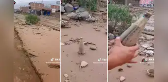 Lo que el huaico arrastra: encuentra una botella de cerveza Cusqueña sellada en medio del barro Lo que el huaico arrastra: encuentra una botella de cerveza Cusqueña sellada en medio del barro