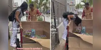 Peruano usa su carretilla para trasladar a joven en inundación y que no ensucie su uniforme Peruano usa su carretilla para trasladar a joven en inundación y que no ensucie su uniforme