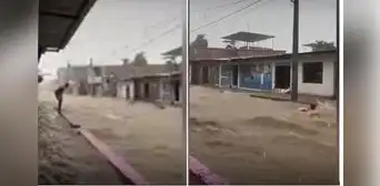 Niños arriesgan sus vidas bañándose en torrente caudaloso formado por intensas lluvias en Piura