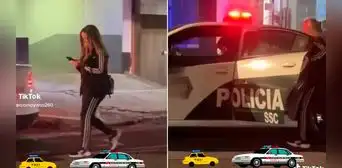 Mujer entra a carro de policía sin darse cuenta: “Todo por usar el celular” Mujer entra a carro de policía sin darse cuenta: “Todo por usar el celular”