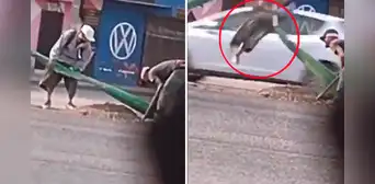 Momento en que ladrón sale disparado por los aires cuando robaba los cables de un poste Momento en que ladrón sale disparado por los aires cuando robaba los cables de un poste